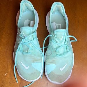Nike free runs running sneakers in tiffany blue